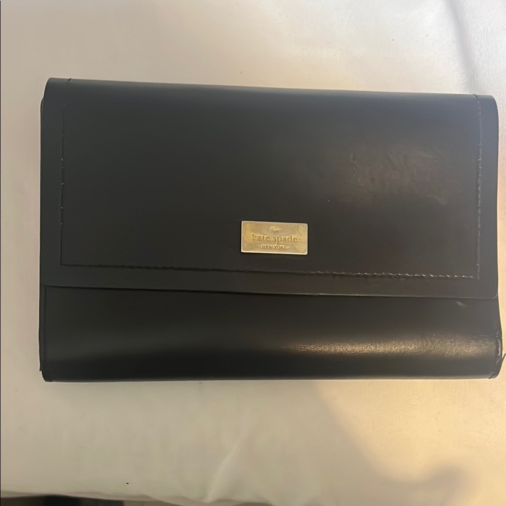 kate spade Black and Silver Clutch with Flap Closure and Smooth Leather